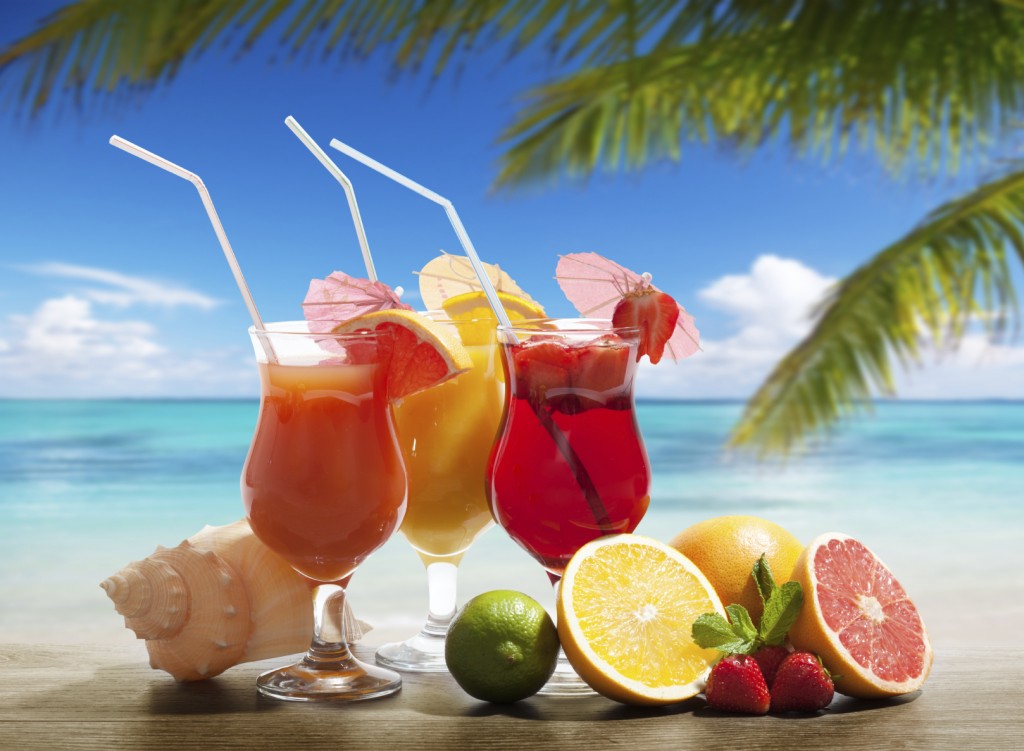 cocktaisl and tropical fruit on the beach